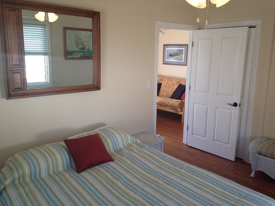 Beautiful paneled door opening up to the living room