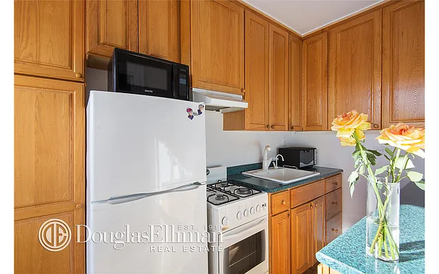 Sold by Douglas Elliman | media 11