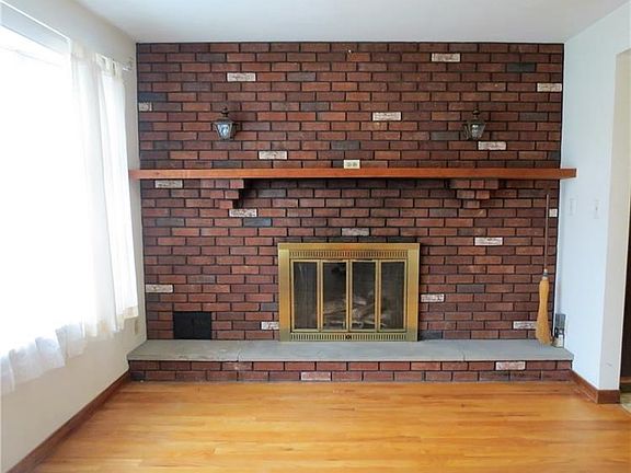 LOG BURNING OR GAS FIRE PLACE; YOUR CHOICE!! COZY UP IN THE FAMILY ROOM WITH A GOOD BOOK AND ENJOY!