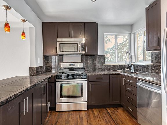 Updated kitchen with stainless steel appliances