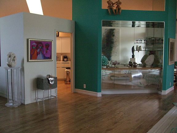 very open living room, dining room & family room w/ beautiful hardwood floors