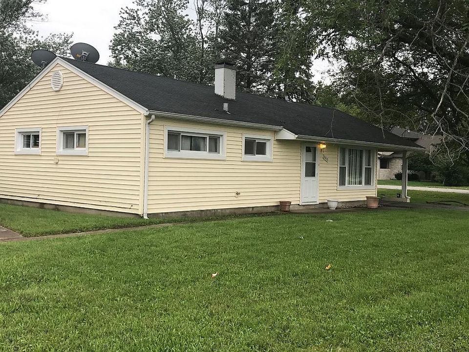 Front of the house. With a carport