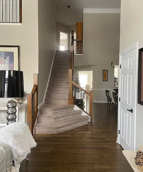 Custom staircase leads to the interior apartment.