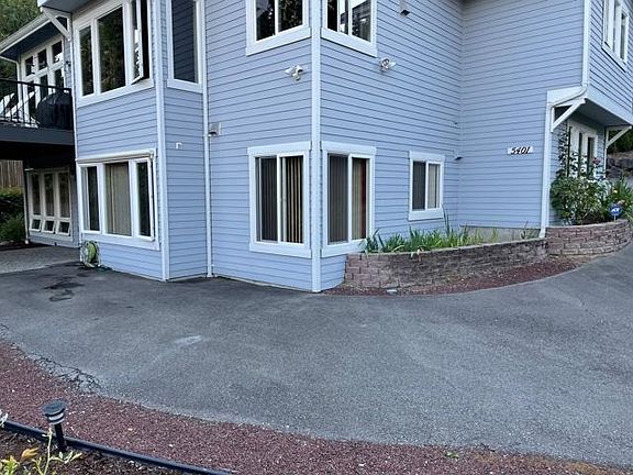 Outside view of parking and kitchen windows