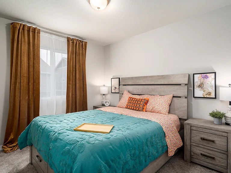 Queen bed with storage under bed, side tables & lamps