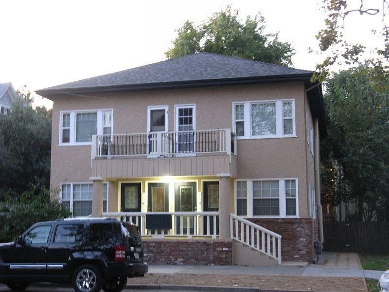 private entry to upstairs apartment on the right side of the building