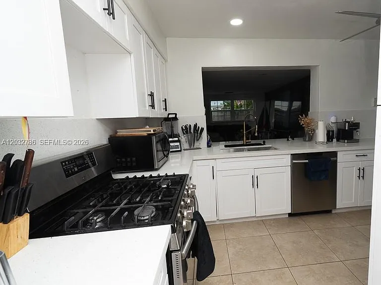 5941 NW 14th Ct — Photo 5
