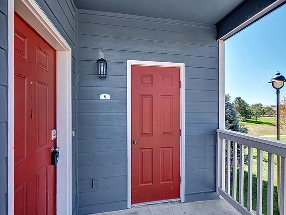 Entrance to condo and to storage/hot water heater. Outside patio.