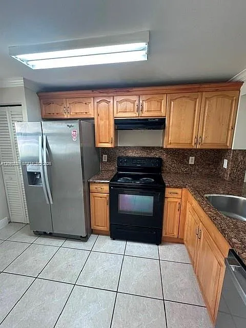 911 NE 209th Ter #102-27
