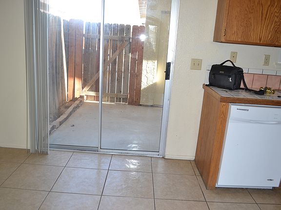 Kitchen w/sliding door to enclosed patio