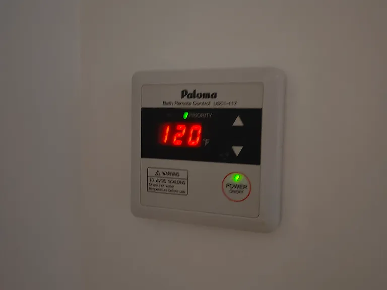 Temperature control for tankless gas water heater