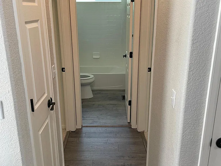 Hallway to kids bath and bedrooms
