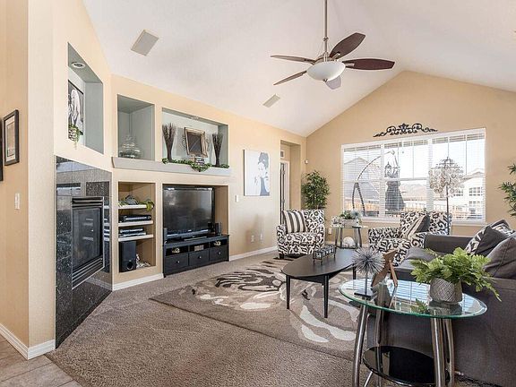 Open and bright great room with cozy fireplace