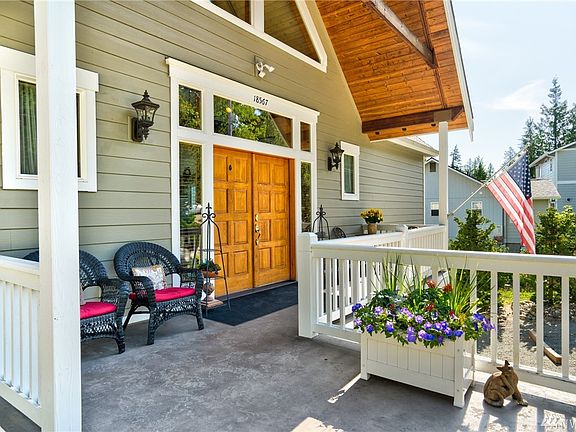 Wonderful covered front porch with double doors and no steps to the interior.