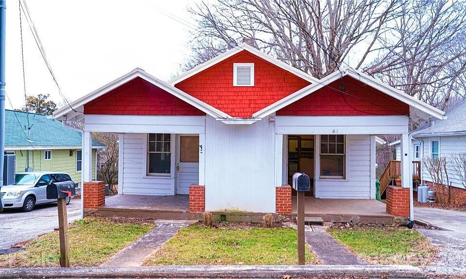 View of the front of the duplex. 63 is on the left.