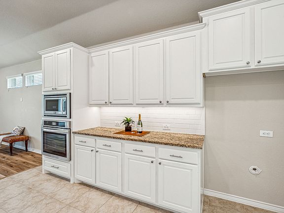 4th image of 3044 Black Hills Blvd N