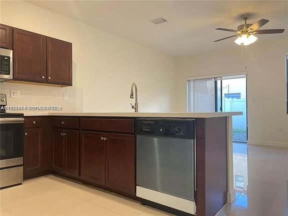 5th image of 10491 W 34th Ct #Townhouse 10491