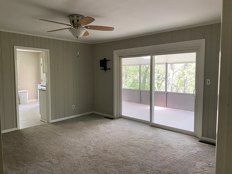 2 of 2 Living Spaces. Has Access to the Private Screened in Deck and Kitchen