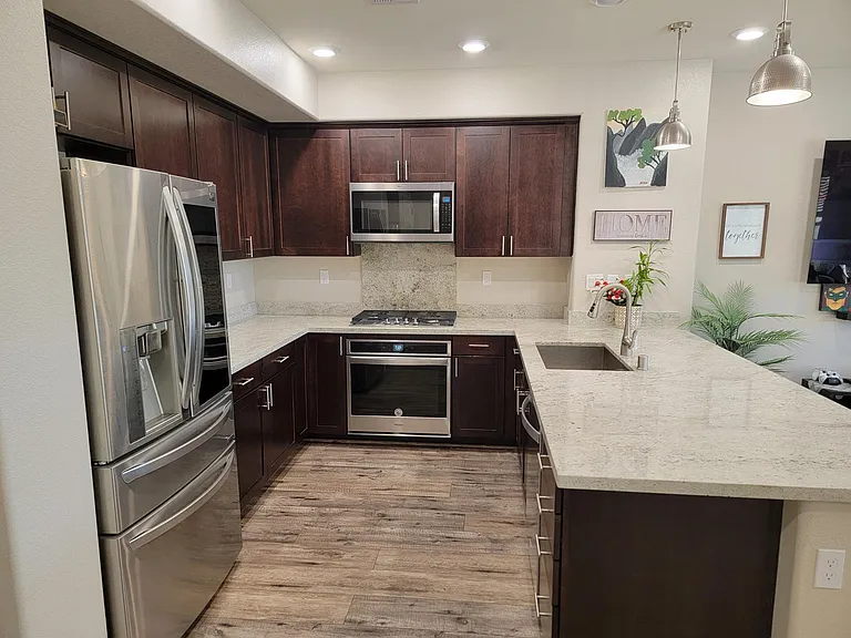 Kitchen with big luxury quartz counter top