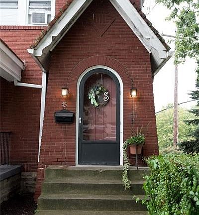Old world charm greets you into this lovely all-brick home.