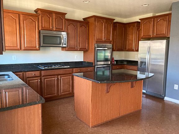 Upgraded kitchen with SS appliances and granite counter tops.