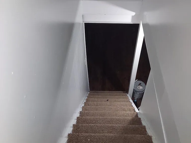 Stair from kitchen to basement