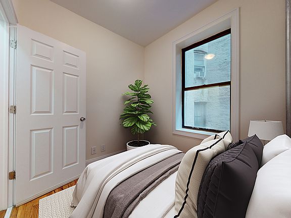 4th image of 229 E 12th St APT 33
