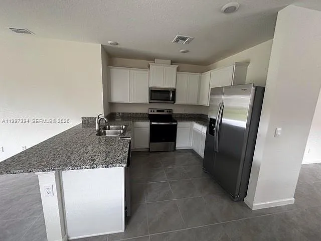 12271 SW Rimini Way — Photo 5