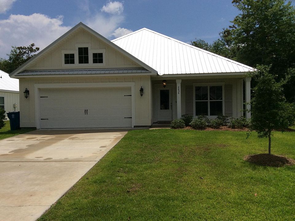 front of house, two car garage