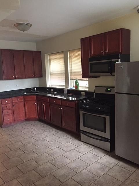 All Cabinets and appliances replaced (old picture for layout only)