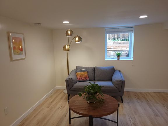 Lounge area with large egress window.