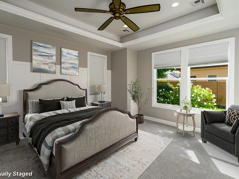 *virtually staged primary bedroom