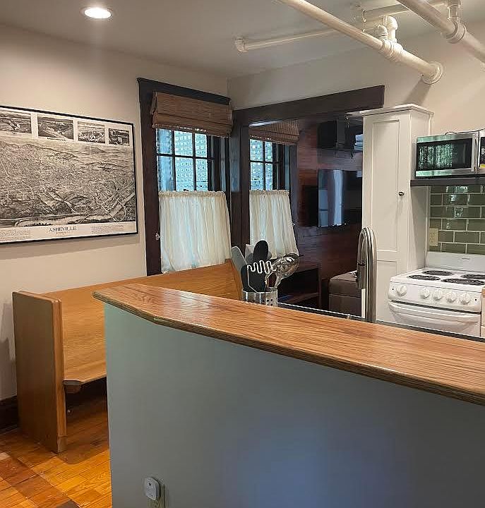 Updated kitchen - with all you need to warm a pizza or bake a cake.