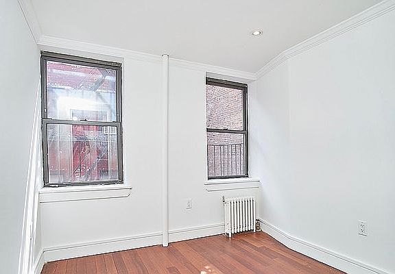 2nd image of 120 E 4th St APT 3A