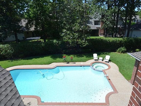 View of pool and yard from above.
