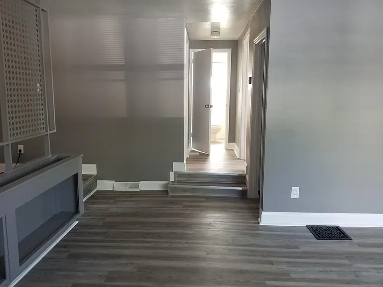 Hallway to bathroom and bedrooms