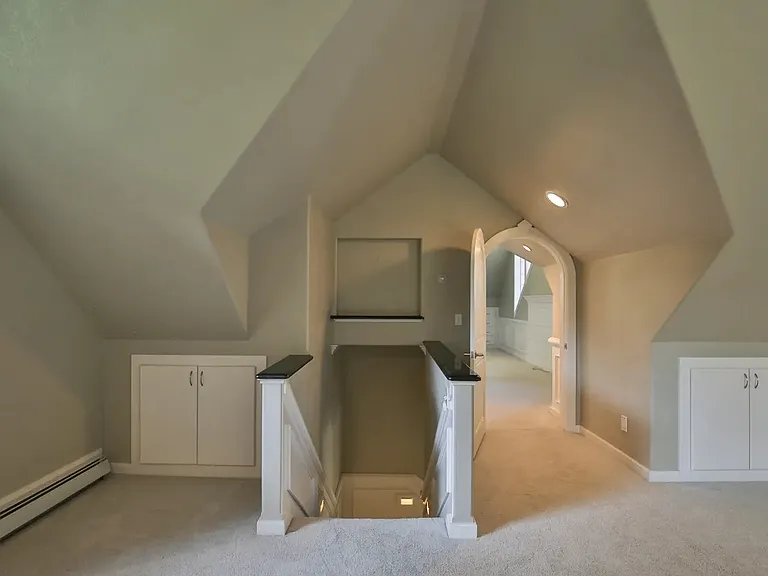 Stairs in bonus room leading to main