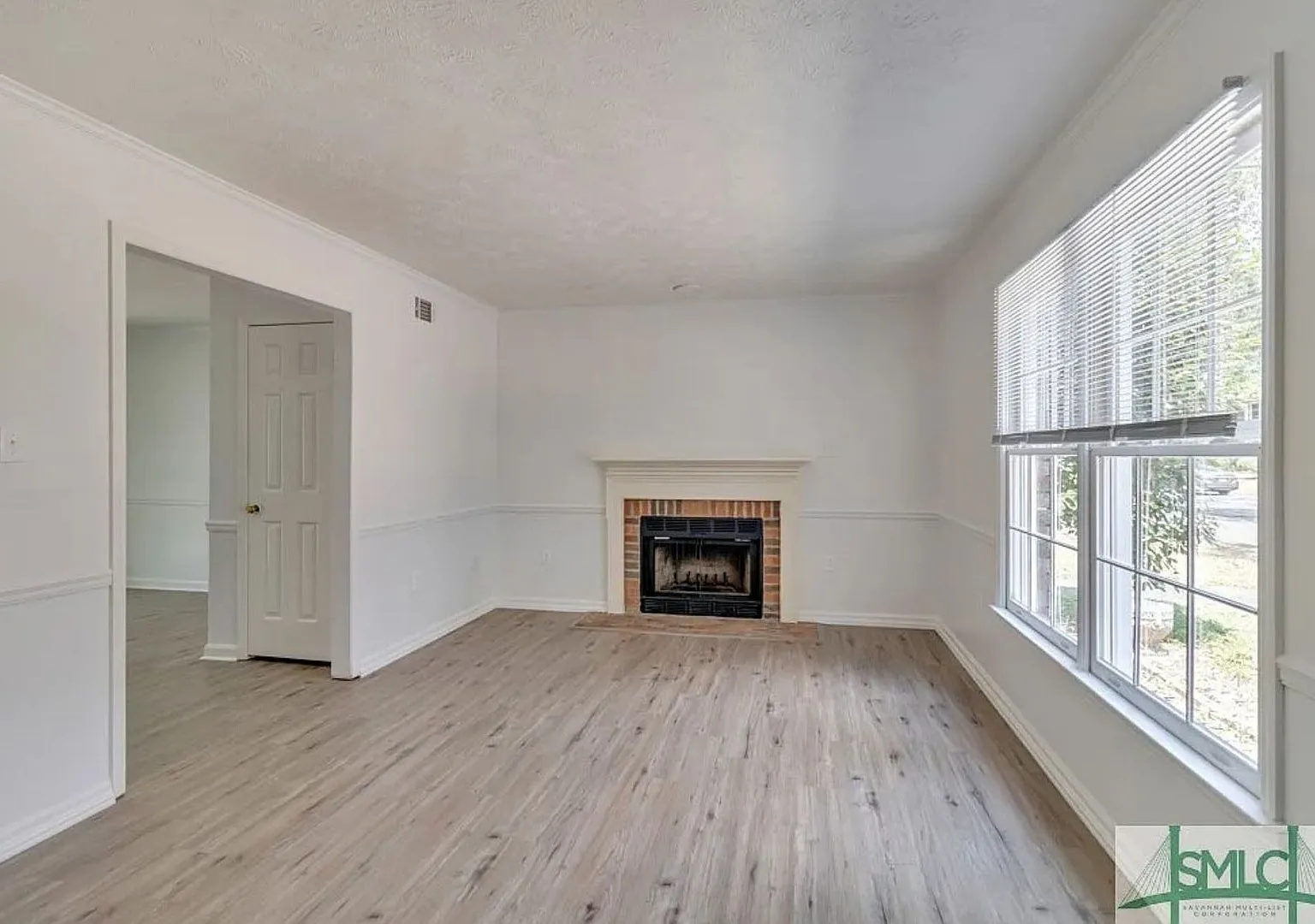 Spacious 2-Bedroom Brick Townhome with Private Fenced Yard — Photo 3