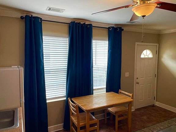 Dining area with new curtains.