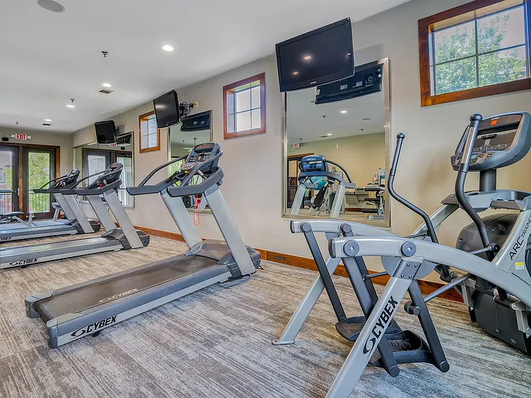 Our fitness center is complete with state-of-the-art equipment and tvs.