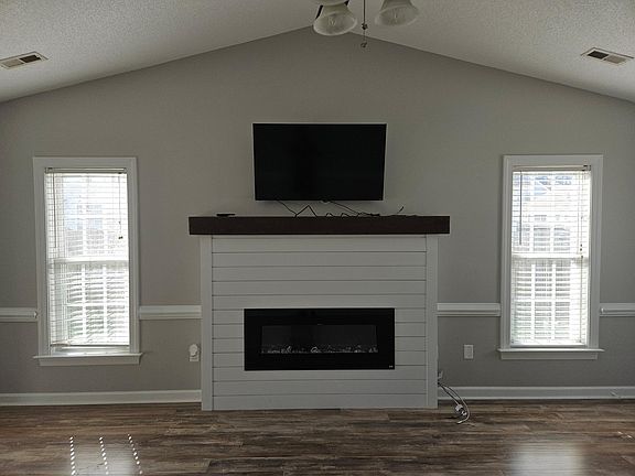 Living room. Electric fireplace works and puts out heat. TV not included in rental but available for purchase if interested. Wall mount will be included.
