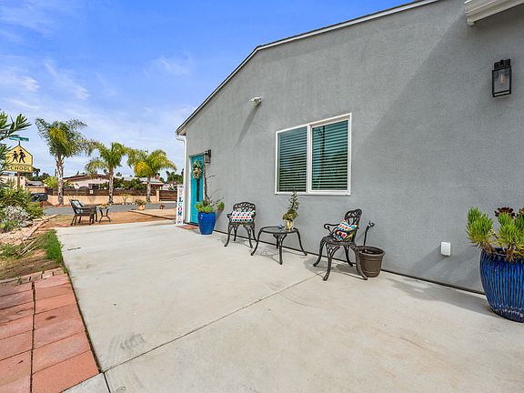 Main (Private) entrance. View of front patio and side patio for your exclusive use.