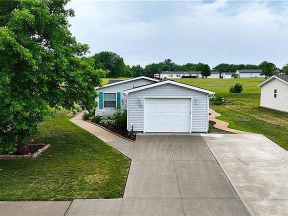 5th image of 927 NE White Oaks Ln