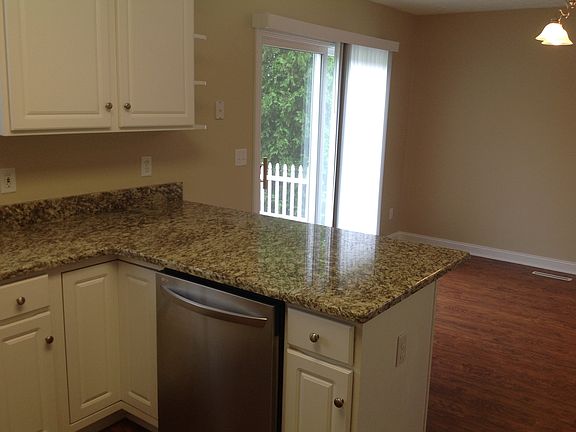 Kitchen with new granite and new flooring