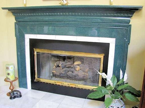 Beautiful marble hearth & mantel!