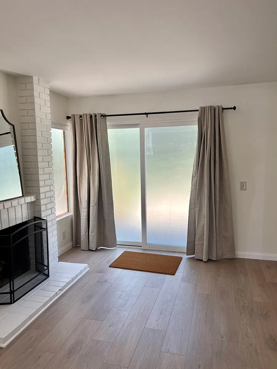hearth room with slider to back yard. Window is covered due to exterior stucco work in this photo! - 21426 Via Floresta