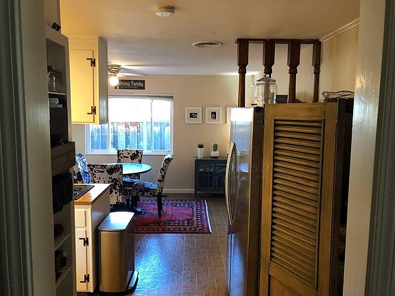 Entrance to kitchen to the left of the entryway