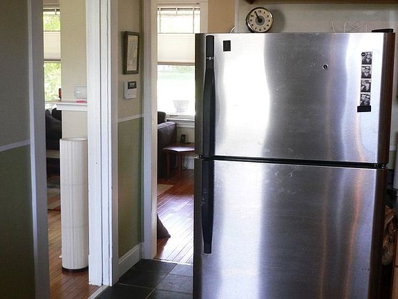 Open access to kitchen from dining room and living room.