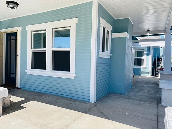 Wrap around front patio