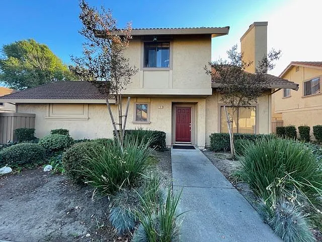 Front of townhouse with nice low maintenance landscaping.